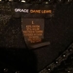 NWOT rayon/nylon blend blouse w jeweled/beaded neckline/cuffs & side slits Lg